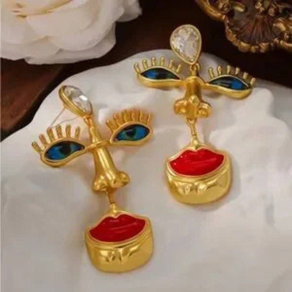 Surreal Face Motif Gold Drop Earrings